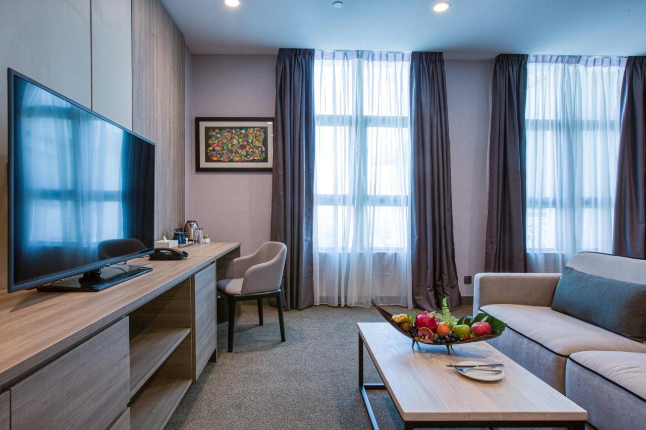 Mercure Living Putrajaya Zewnętrze zdjęcie A living room in a serviced apartment in Moscow, Russia